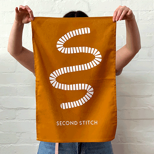 A gif of Second Stitch, a social enterprise that makes fabric products such as masks and towels.