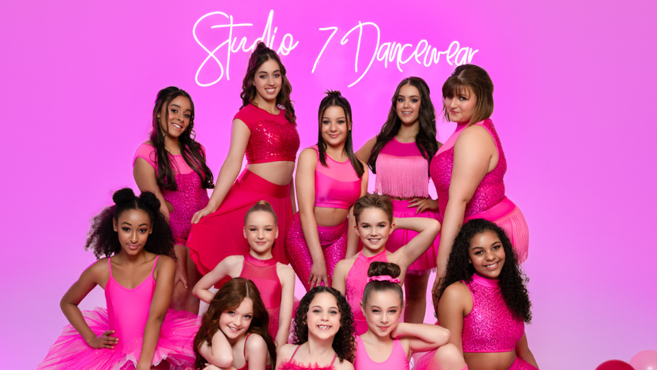 Girls from Studio 7 Dancewear wearing dancing pink dance clothing.