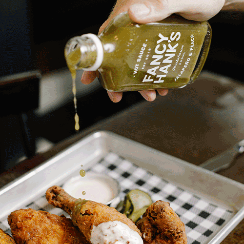 A gif of several Fancy Hanks sauces. Some images are just the bottle and others are of the bottle being poured onto food.