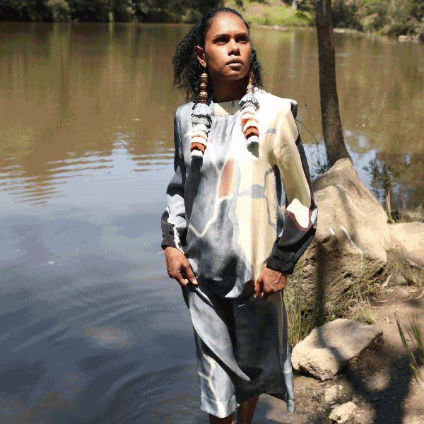 A gif of Ngali, a clothing store. There are images of female models wearing various outfits in nature and in a studio.