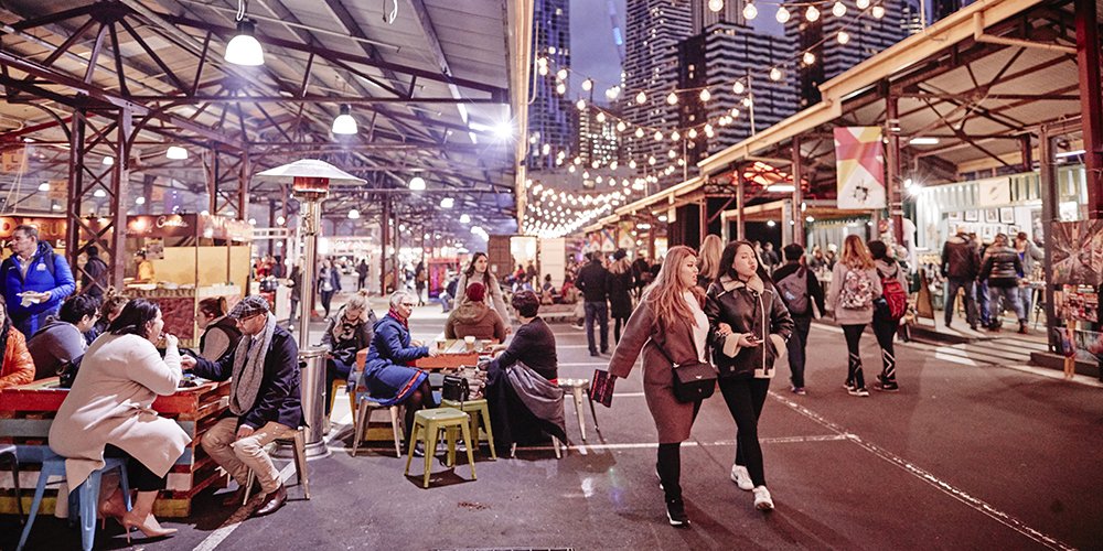 People at the Queen Victoria night markets.