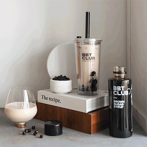 A gif of a bubble tea kit. There are a few still images of the bubble tea kit being made and ready to drink.